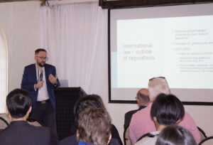 Man giving a presentation at a conference