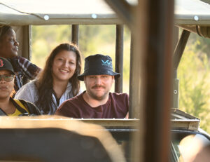 4 people in a jeep on safari