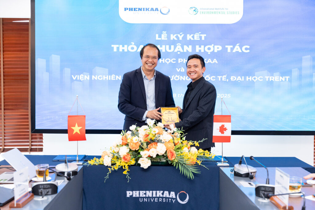 Professor Phu Khanh Nguyen (left) from Phenikaa University and professor Huy Dang (right) from Trent University at the Signing Ceremony at Phenikaa University in Hanoi, Vietnam.